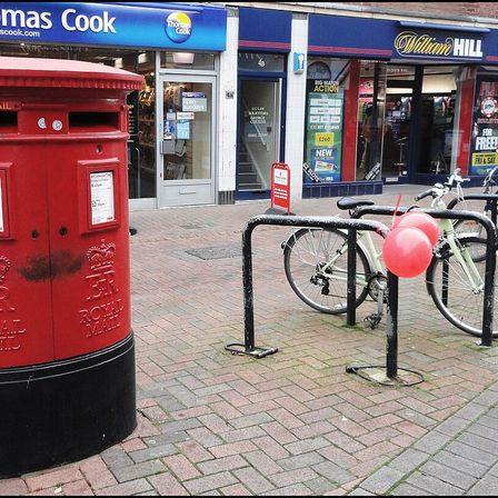 Photograph: Hereford ... bike rack with red balloons (please, not that song again). - Flickr - BazzaDaRambler